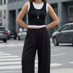 Pantalón fluido cintura alta wide leg con pinzas