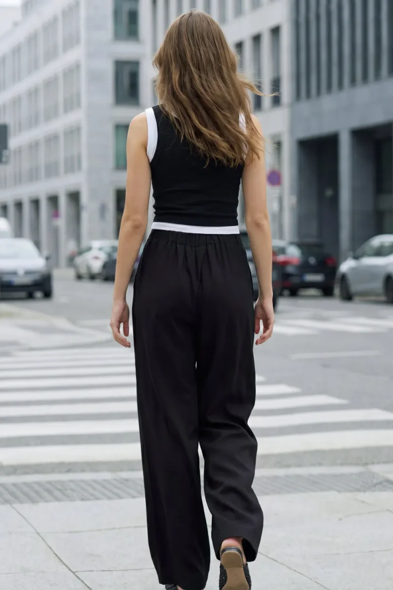 Pantalón fluido cintura alta wide leg con pinzas - Imagen 5