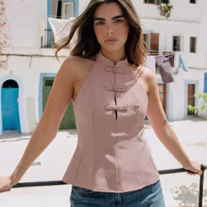 Top peplum alamares