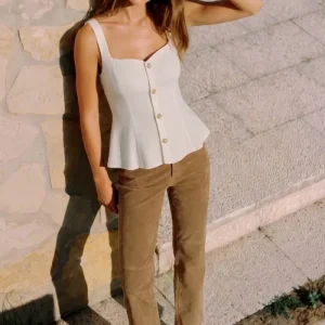 Top peplum botones