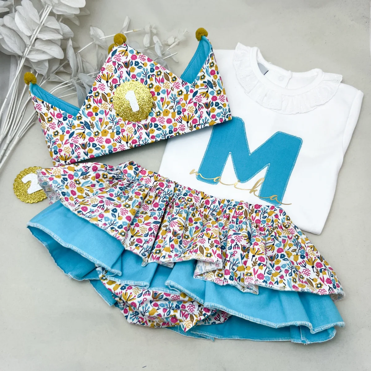 Conjunto cumpleaños cubrepañal con dos volantes primavera