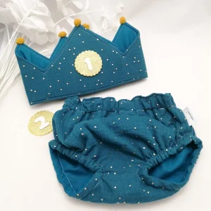 Conjunto corona cumpleaños y cubrepañal muselina océano