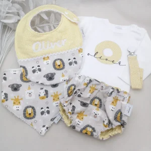 Canastilla bebé personalizada cinco piezas con cubrepañal reversible, body, babero, chupetero y bandana