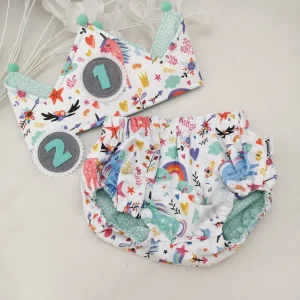 Conjunto corona cumpleaños y cubrepañal unicornios motas mint