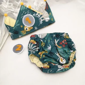 Conjunto corona cumpleaños y cubrepañal selva con mostaza